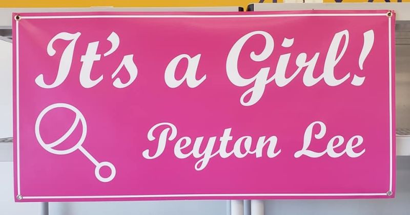 Pink hanging banner.