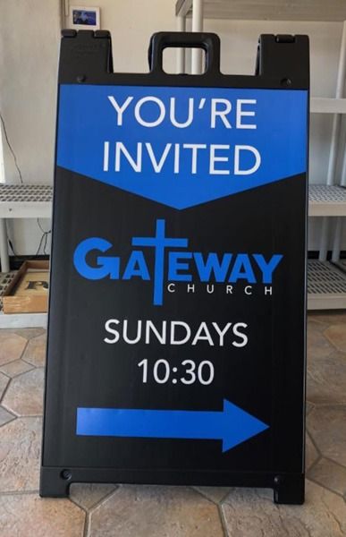 Portable sign for a church.