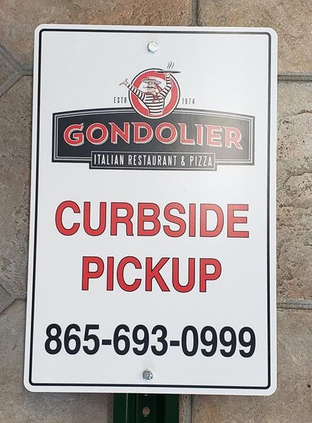 Curbside pickup parking sign.