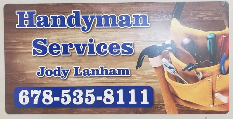 Yard sign for handyman services.